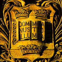 Photo of crest on outside of building